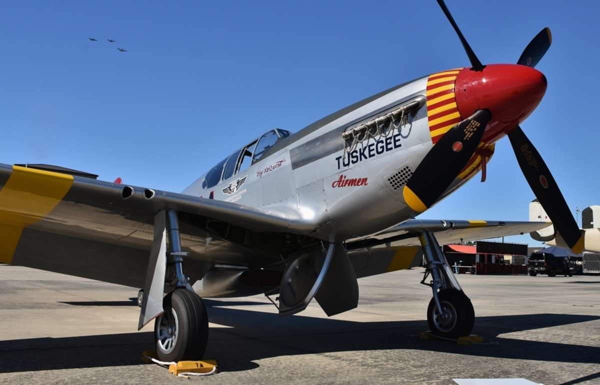 A vintage World War II-era P-51 Mustang from the Tuskegee Airmen Red Tail Squadron at Moody Air Force Base in Georgia